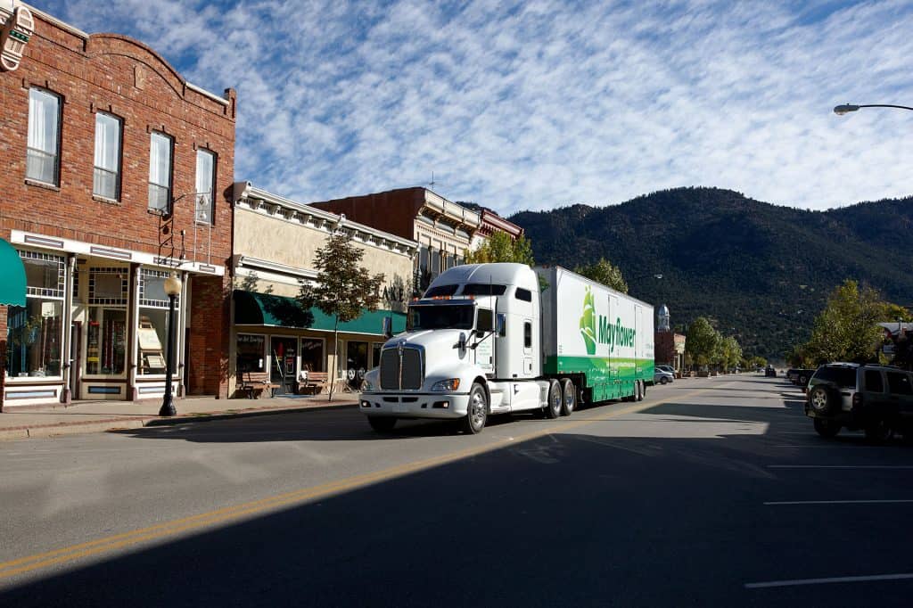 mayflower truck in small town